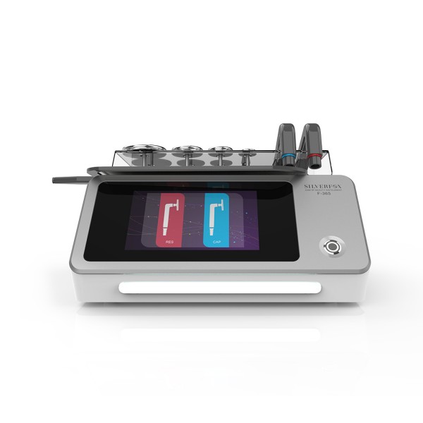 Naprava za tecar terapijo 448K